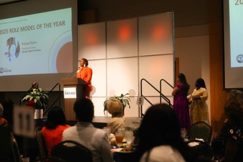 Photo from 2025 Women United Awards with Kenya Dunn, Kim Davis, Brianna Johnson on stage