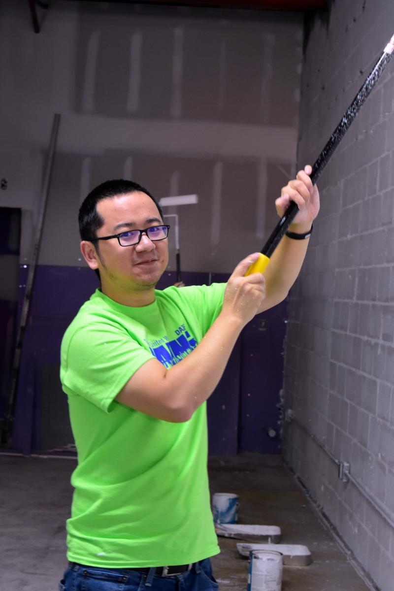 Chen Zhang at Day of Caring volunteering