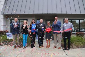 Seven individuals celebrating the ribbon Cutting at the Dorchester Resource Connection Center